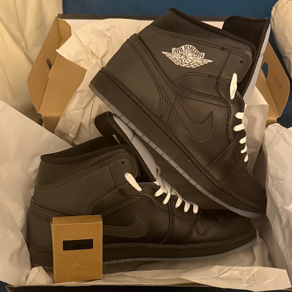 Jordan Black and White High-Top Sneakers